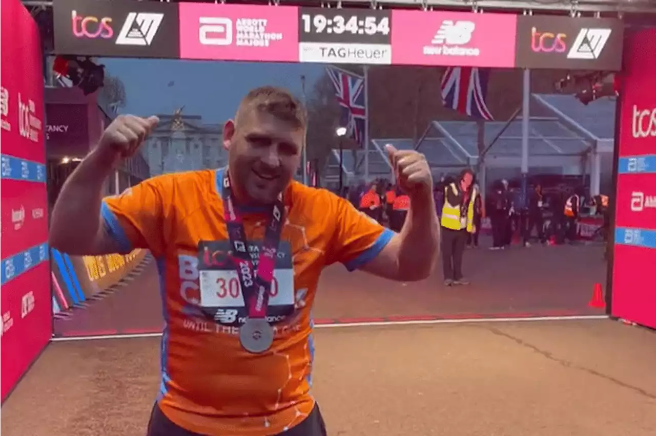 Last London Marathon finisher – running for cancer charity – crosses the line in over 8 hours