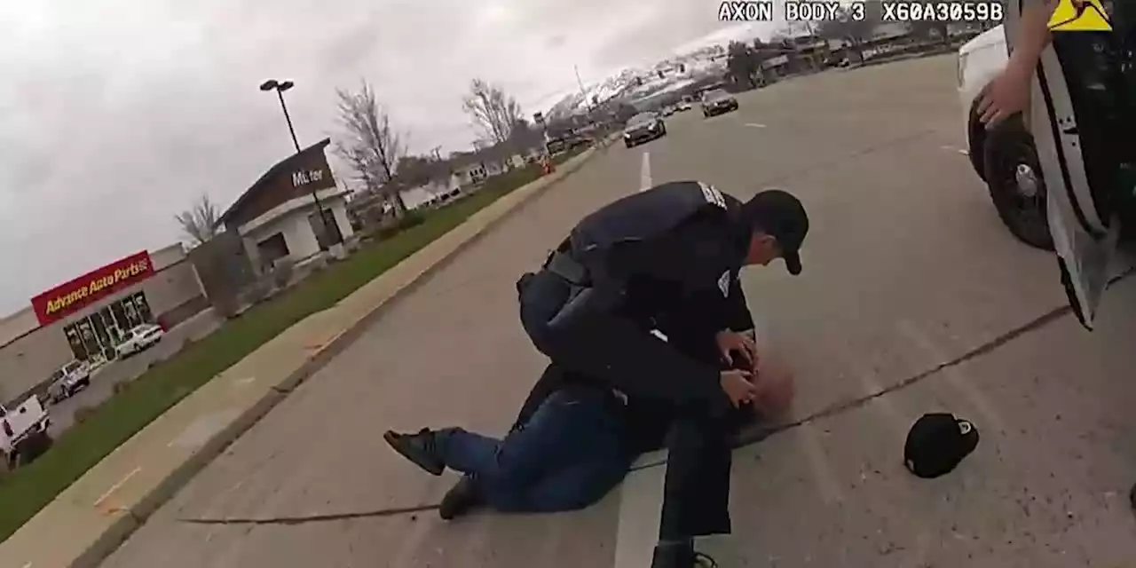 GRAPHIC VIDEO: Officers ruled justified punching man accused of walking into traffic