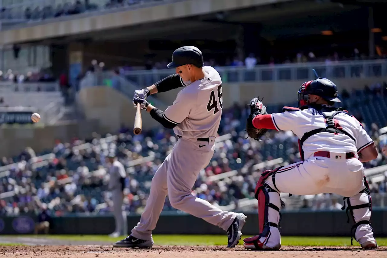 Yankees’ bats break through to avoid Twins sweep