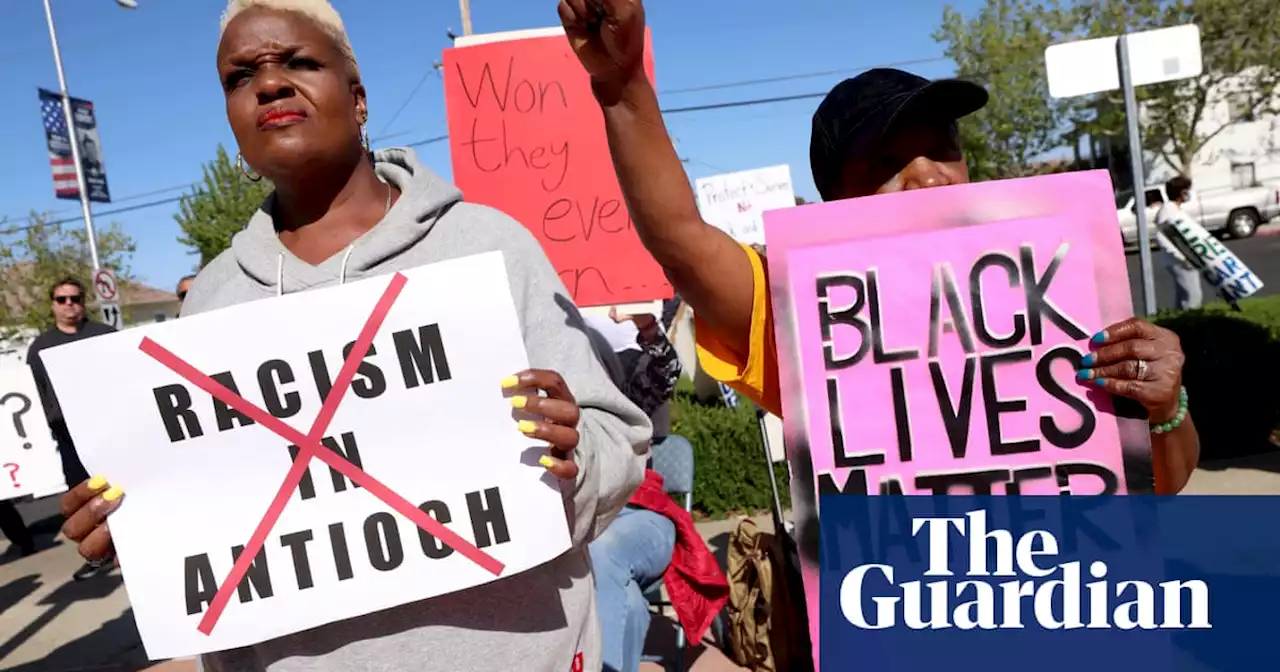 In racist police text scandal, US town sees echoes of an intolerant past