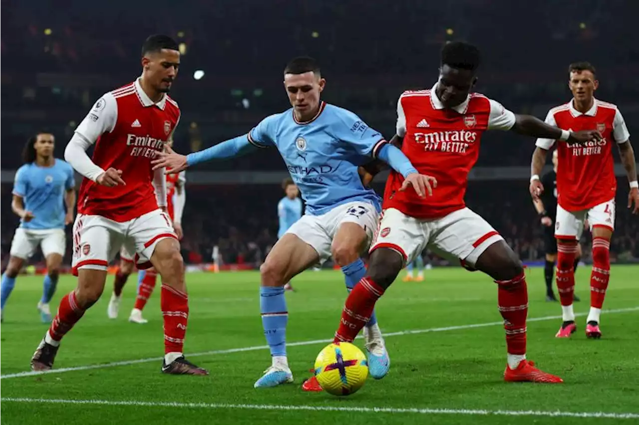 Man City crush Arsenal to take control of title race