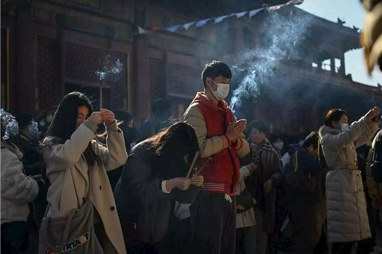 Jobless young Chinese seek solace in temples as China claws way to post-Covid recovery