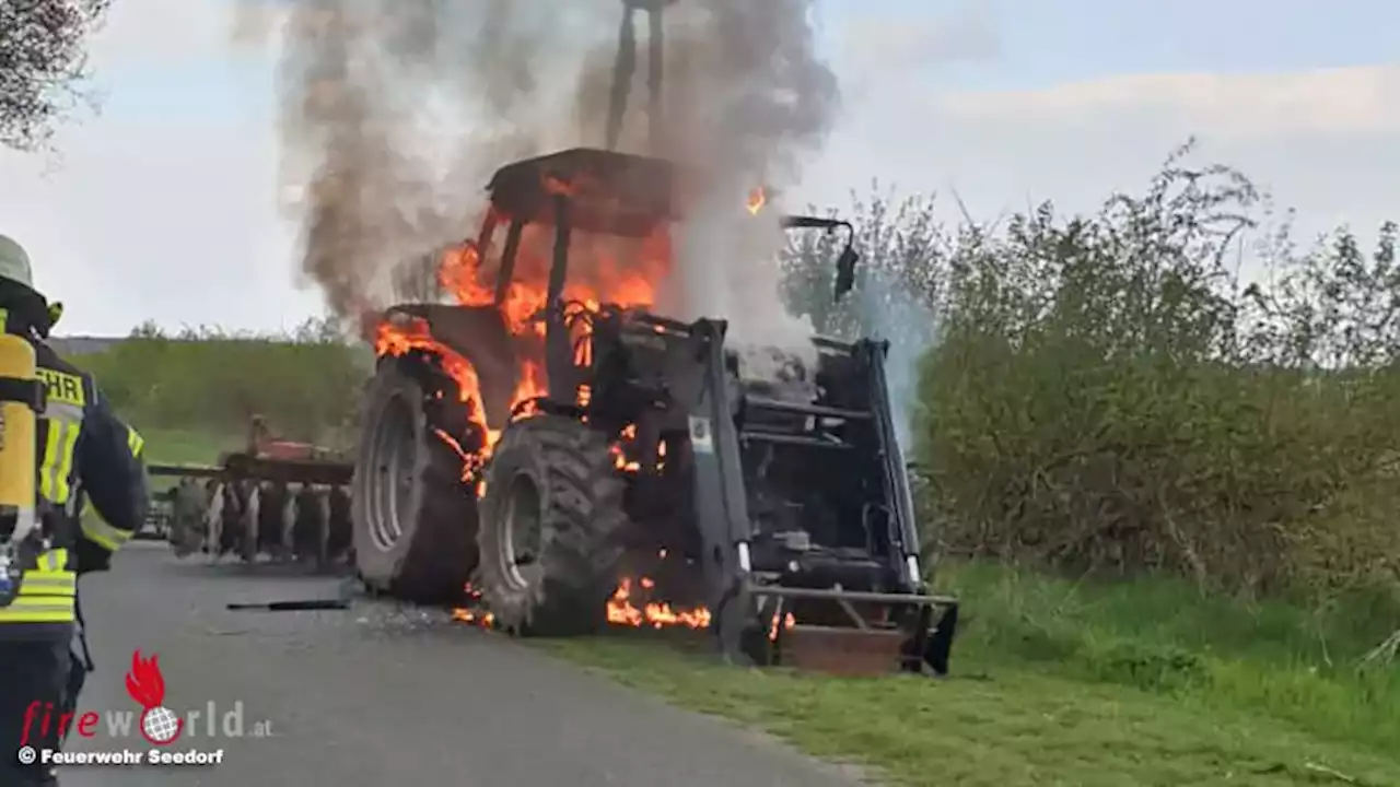 D: In Vollbrand stehender Traktor in Seedorf