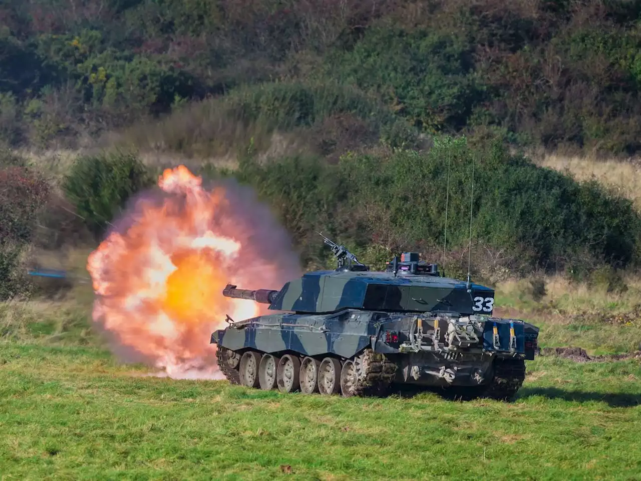 Ukrainian ambassador taking ride in a tank at Telford manufacturer