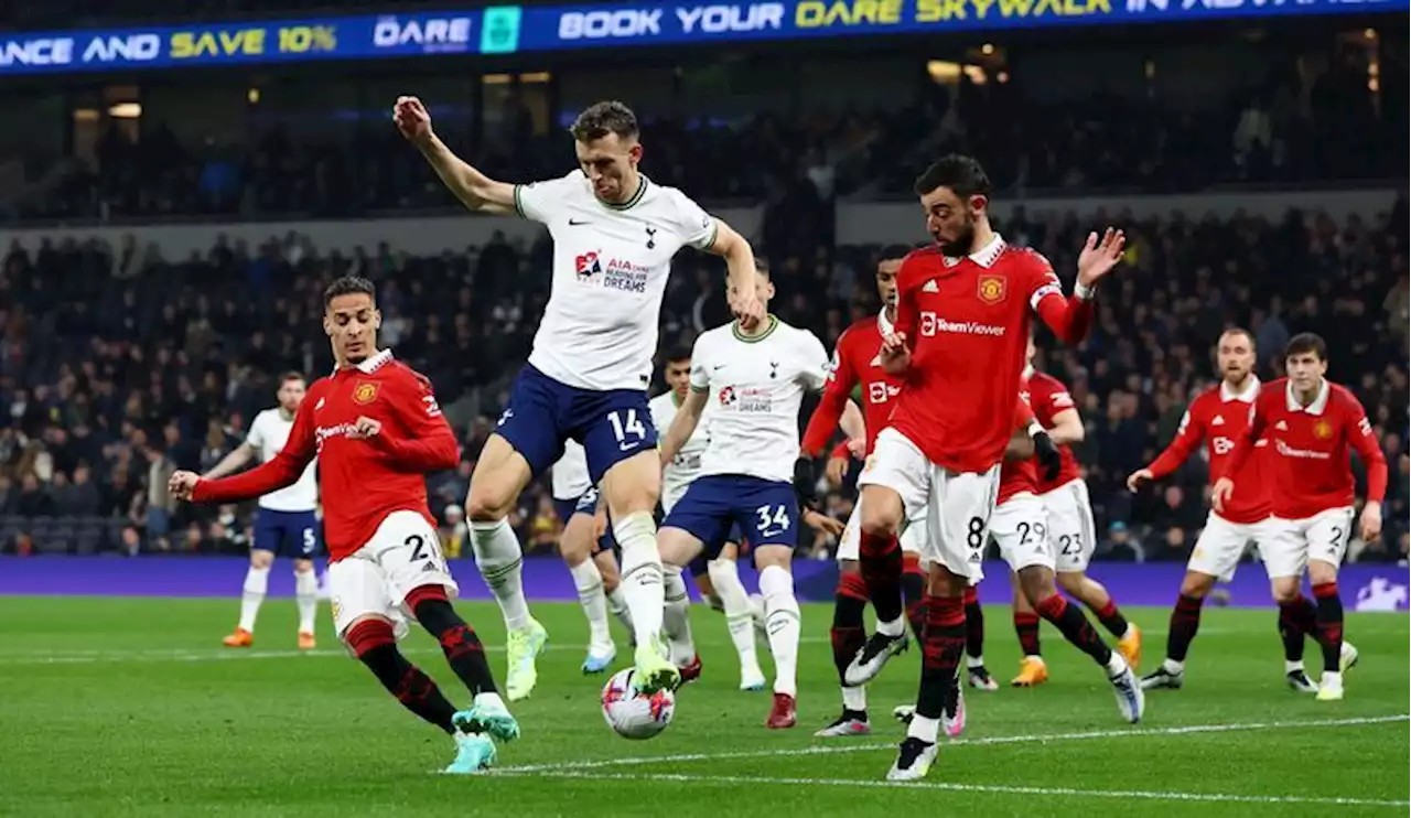 Soccer-Spurs fight back to draw 2-2 with Man United in thriller