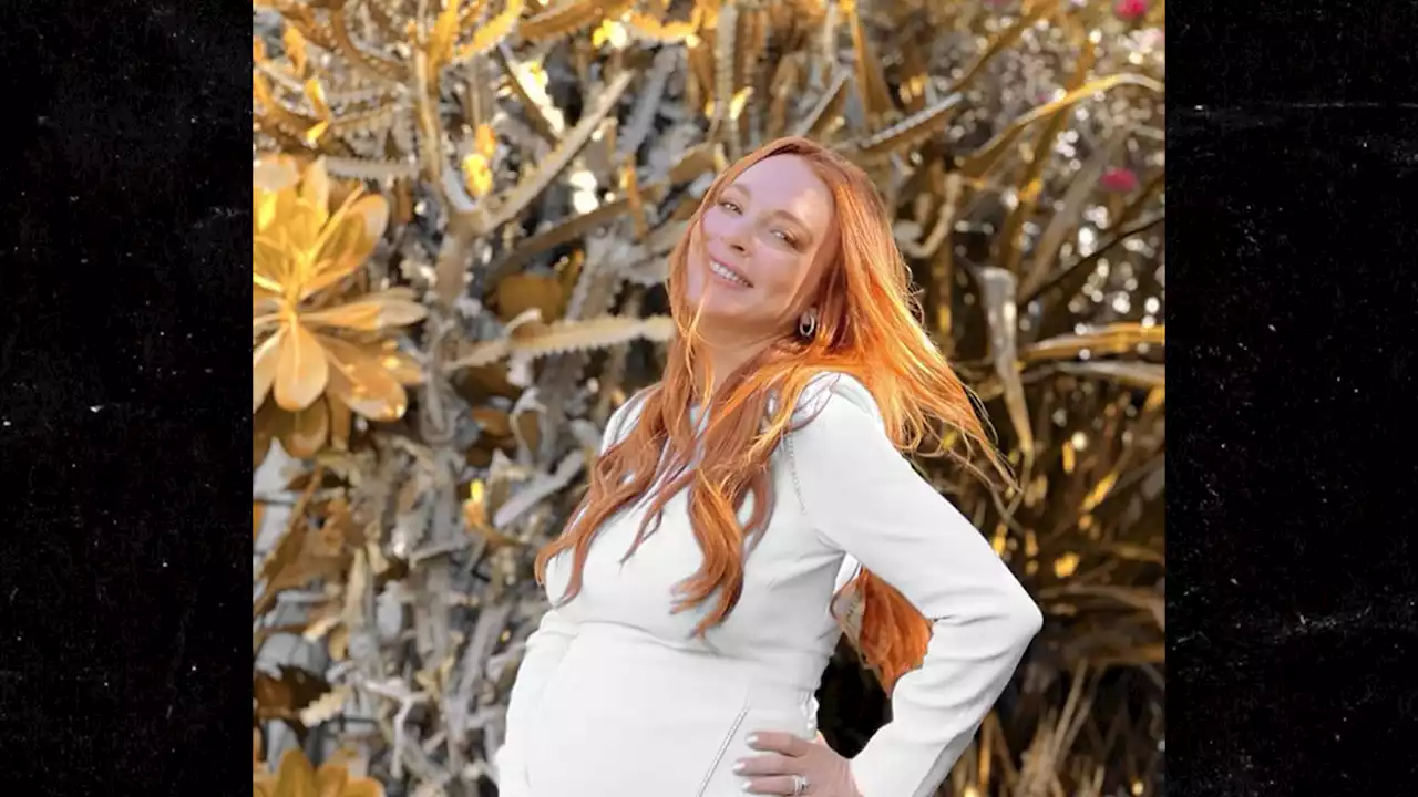 Lindsay Lohan Shows Off Baby Bump