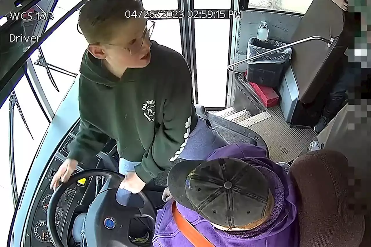 Boy stops Michigan school bus with ill driver
