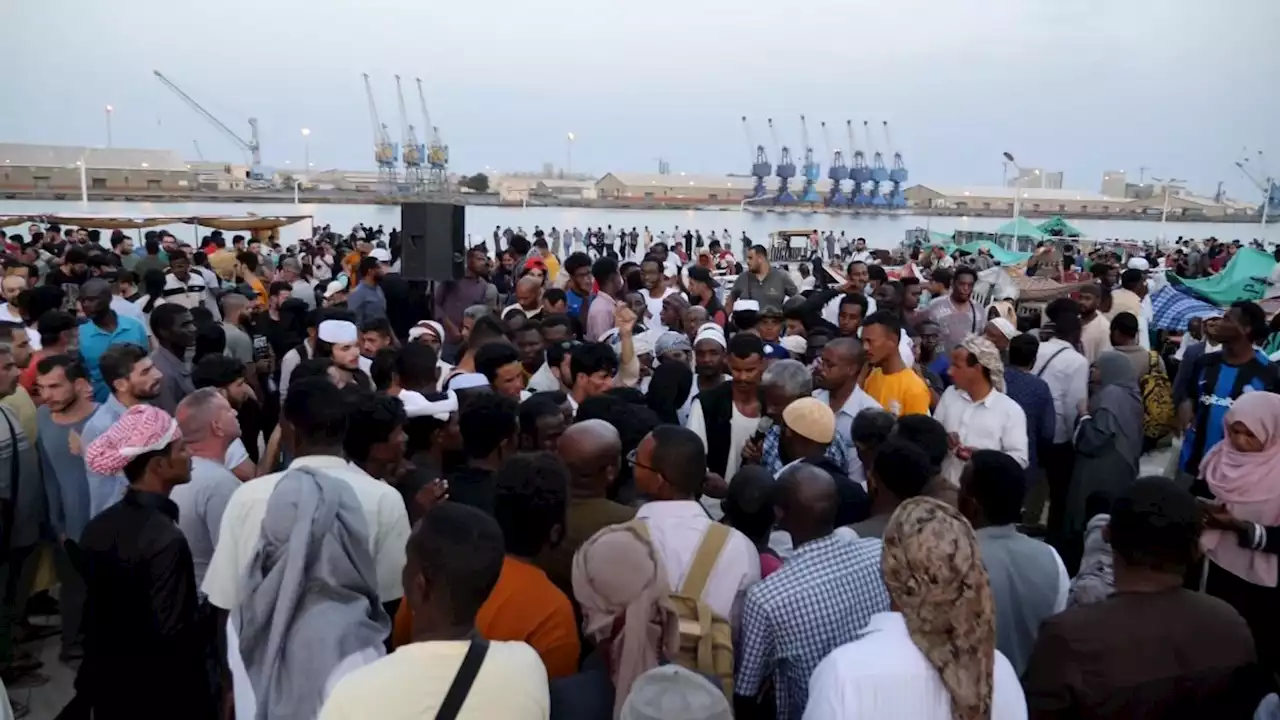 Yemenis and Syrians gathered on docks of Port Sudan feel as though war has followed them