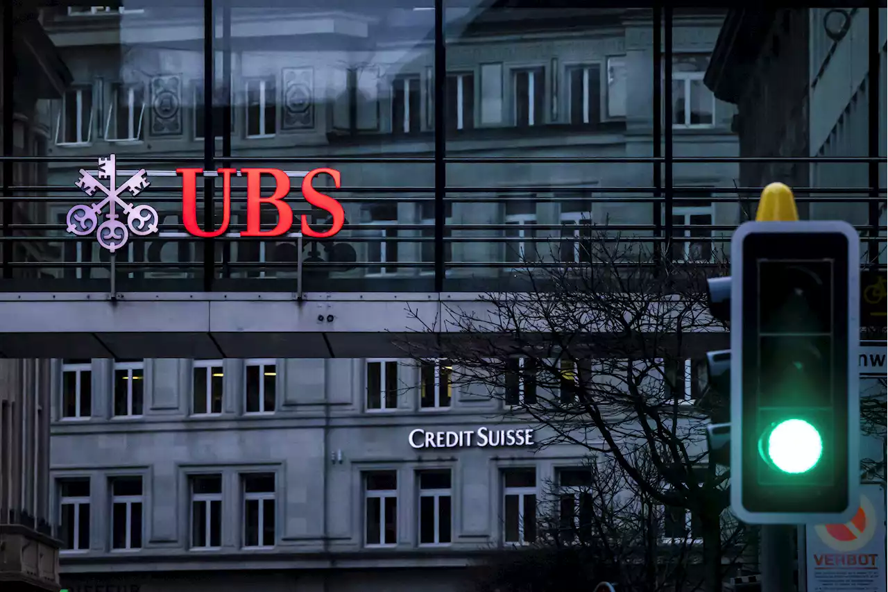 Credit Suisse, UBS shares drop as Swiss prosecutor launches criminal probe over merger