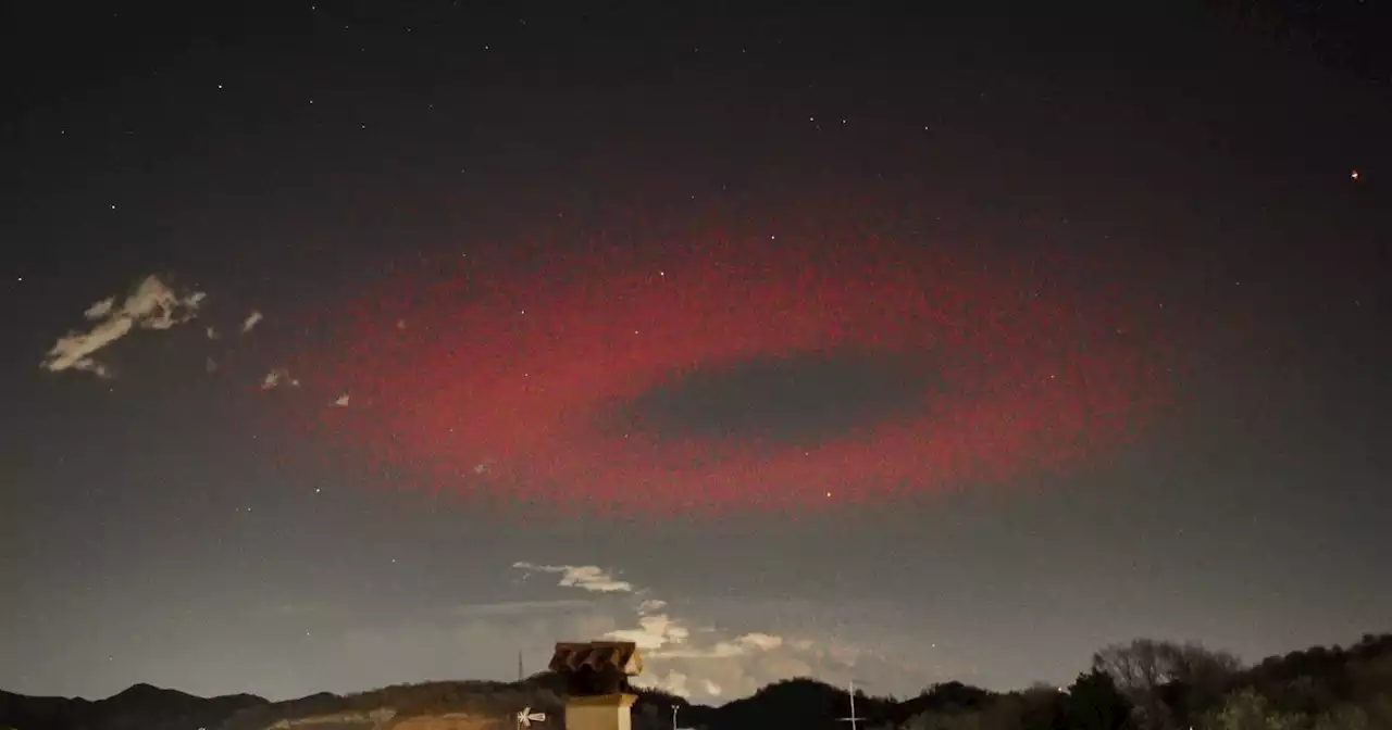 Photographer Captures Ultra-Rare Red Ring of Light Over Italy