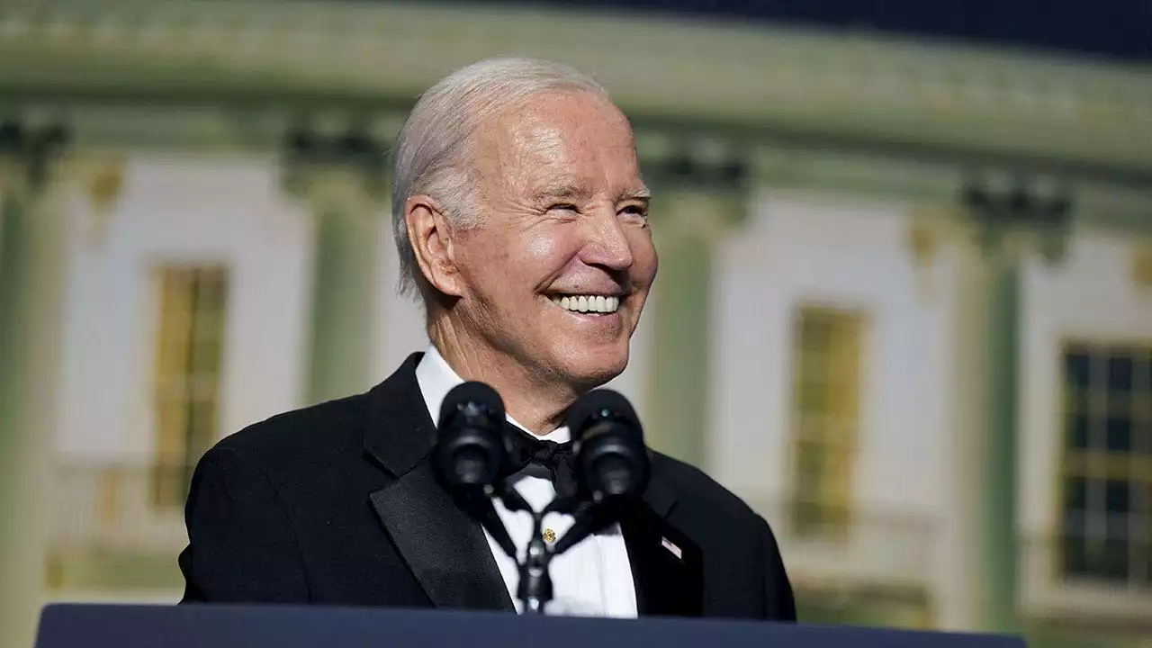 Reporters cheer after President Biden notes he's running for re-election at White House Correspondents' Dinner