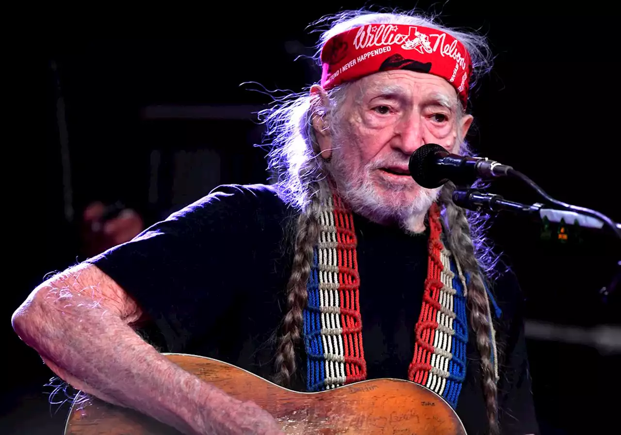 Willie Nelson inhales the love at 90th birthday concert