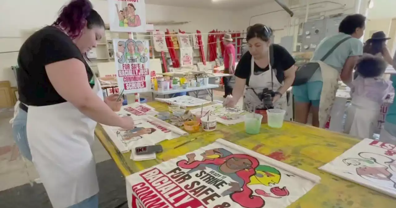 At Oakland 'art build,' teachers paint picket signs in advance of possible strike