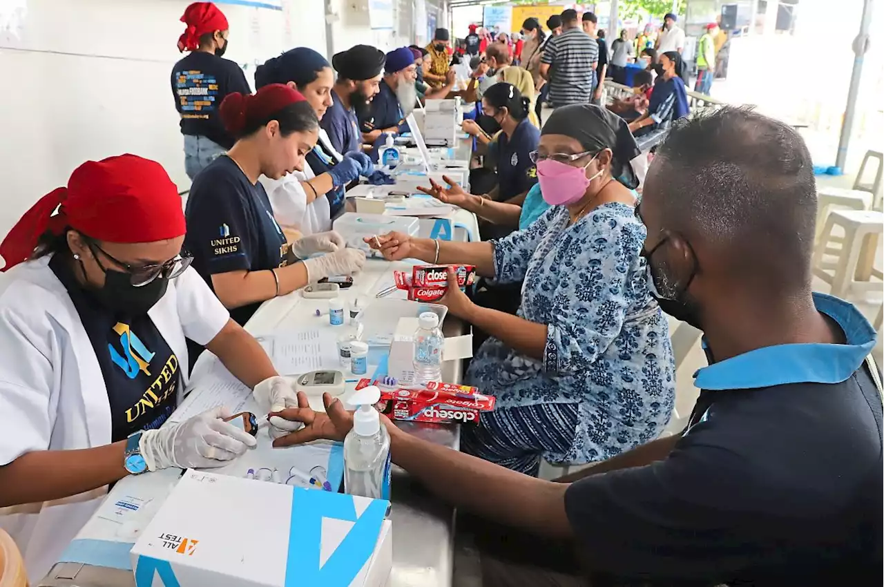 Free health check draws 500 in Penang