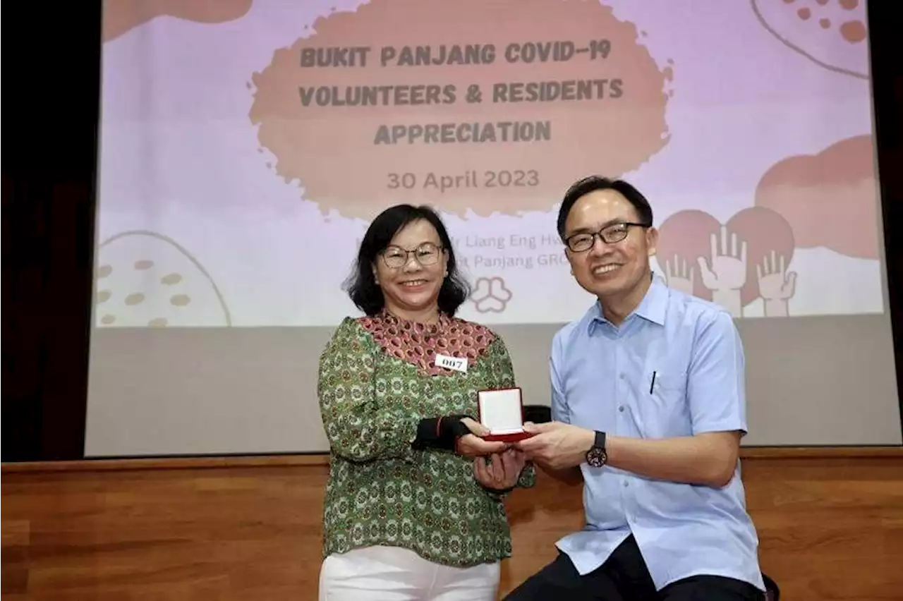 Bukit Panjang Covid-19 volunteers, PA staff given medallions as appreciation for helping residents