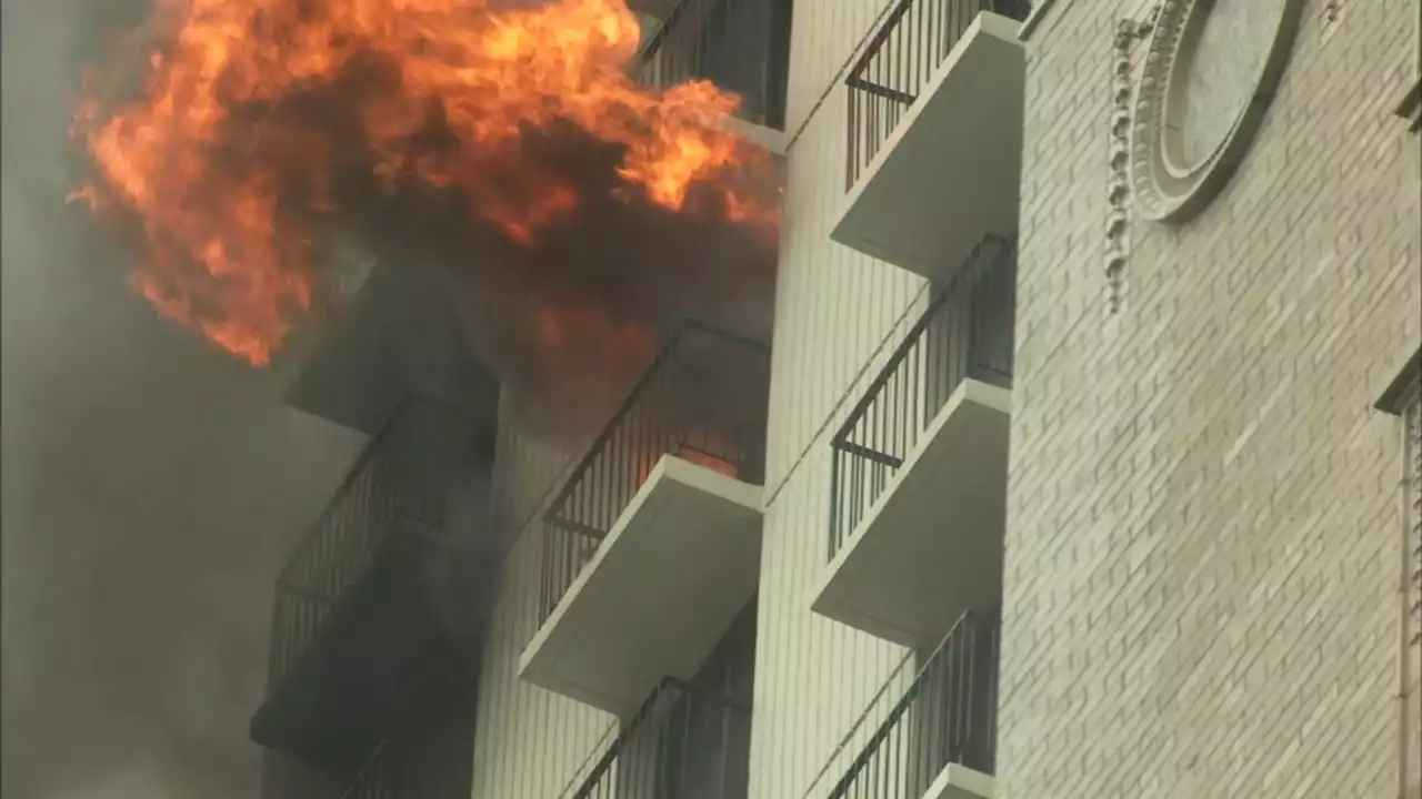 Gold Coast fire: CFD battling blaze in North Side high-rise; flames seen shooting out window