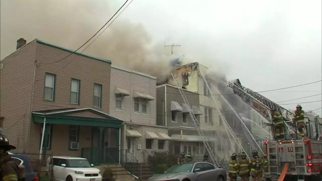 4-alarm fire burning through multiple homes in Jersey City