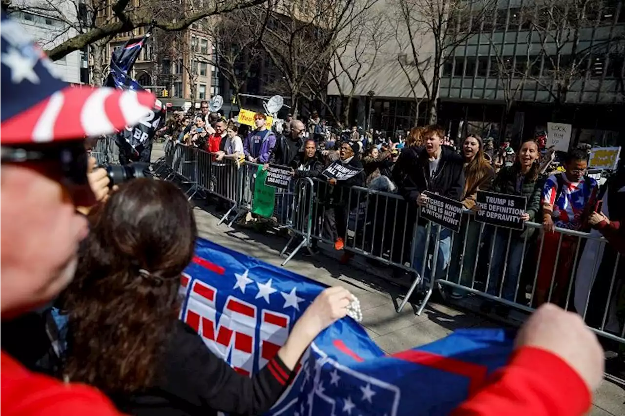 Trump supporters, detractors crowd around Manhattan courthouse for arraignment