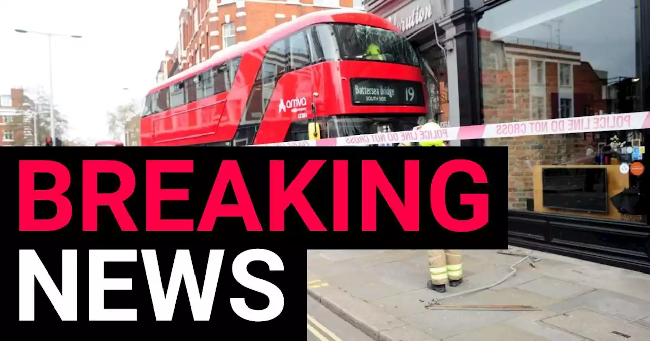 Man taken to hospital after bus crashes into shop in London