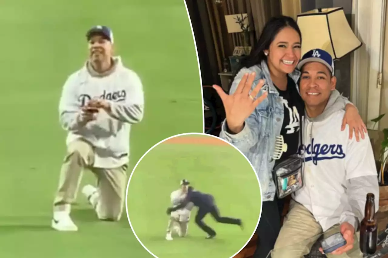 Dodgers fan tackled by security for on-field proposal gets one-year ban