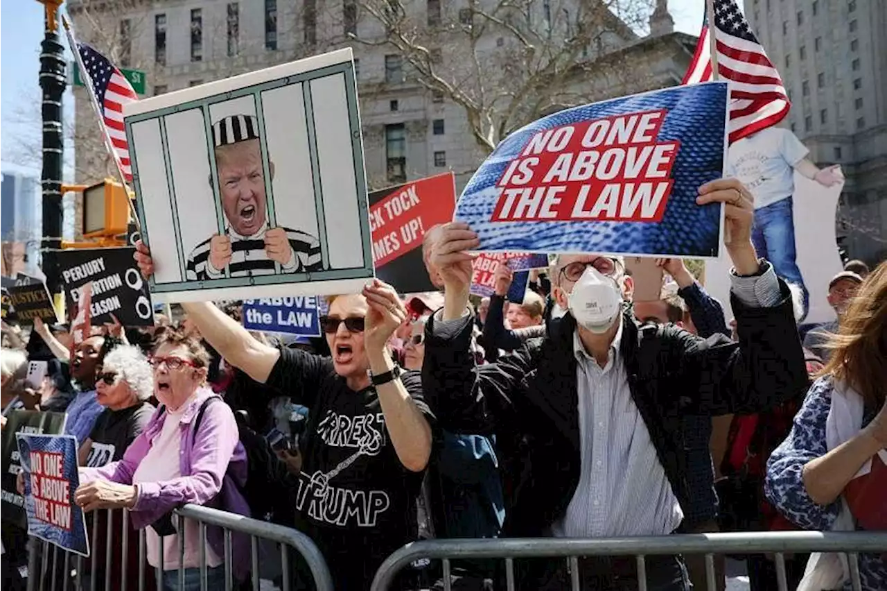 Media spectacle, loud crowds mark former US president Donald Trump’s arraignment in Manhattan