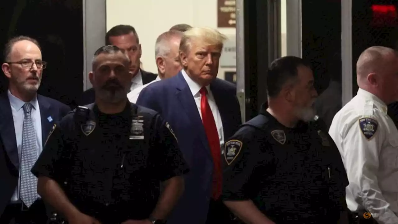 Defiant Trump pleads not guilty to 34 criminal charges