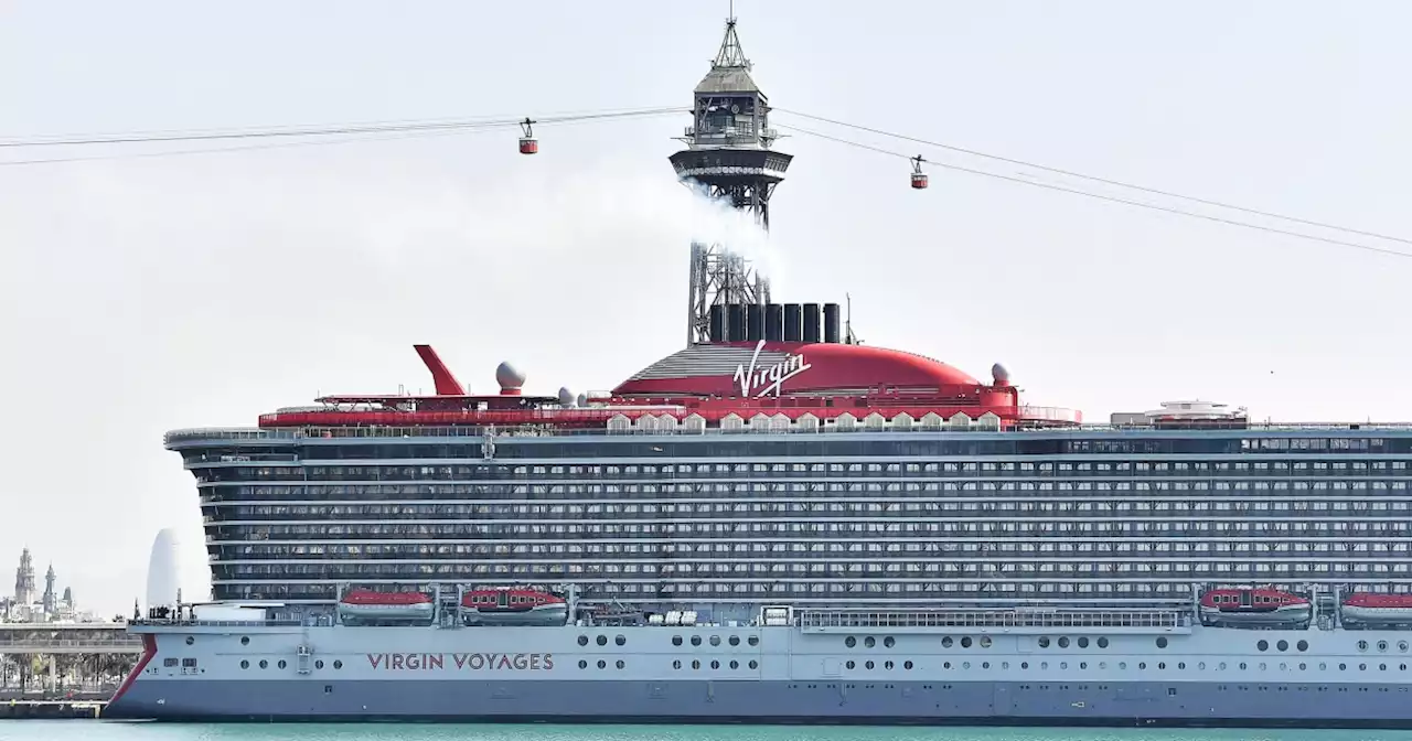 Cruise passenger dies after falling over balcony onto lower deck, spokesperson says