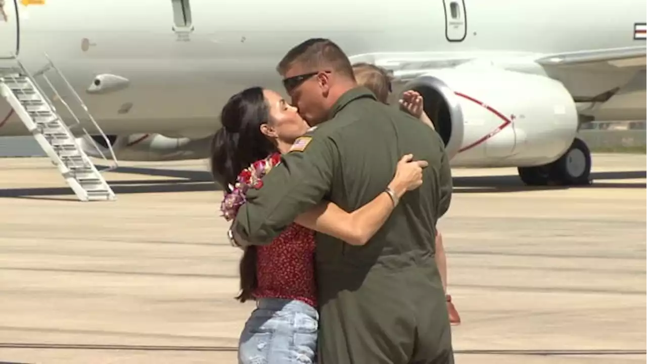 Navy aviators reunited with their families after spending half a year overseas