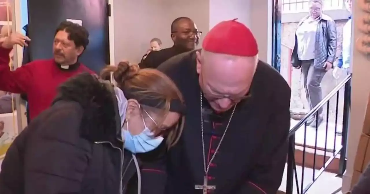 Catholic Charities volunteers hand out hundreds of free meals in Harlem on Holy Thursday