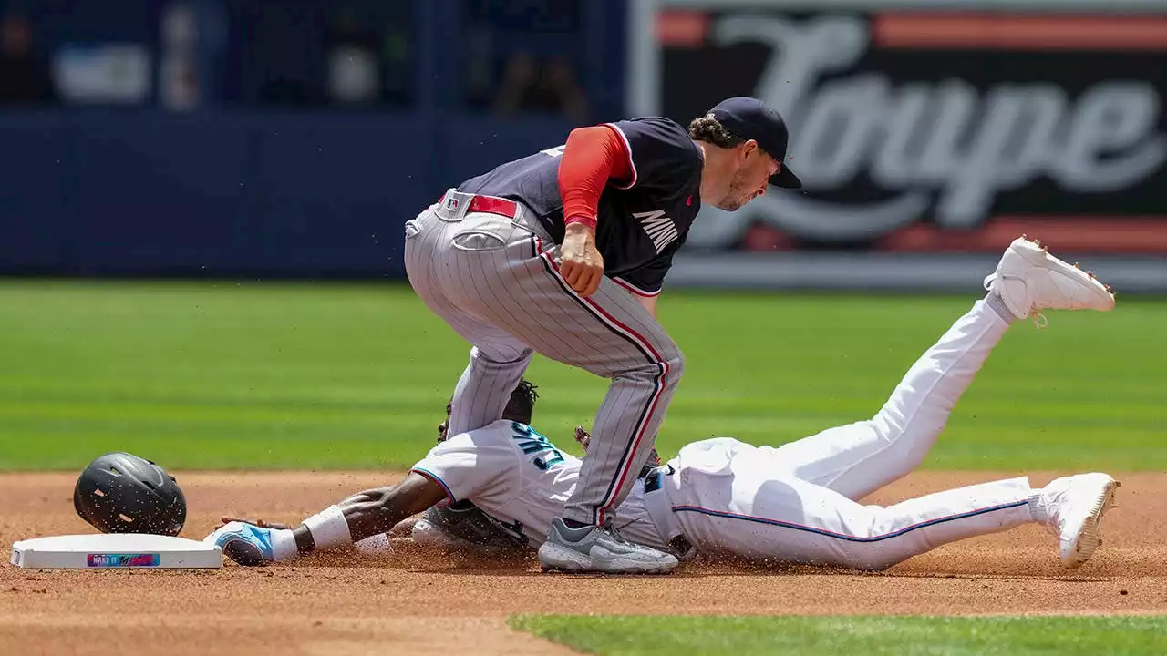 Marlins' Jazz Chisholm Jr. suffers apparent shoulder injury after attempting to steal base, exits game early