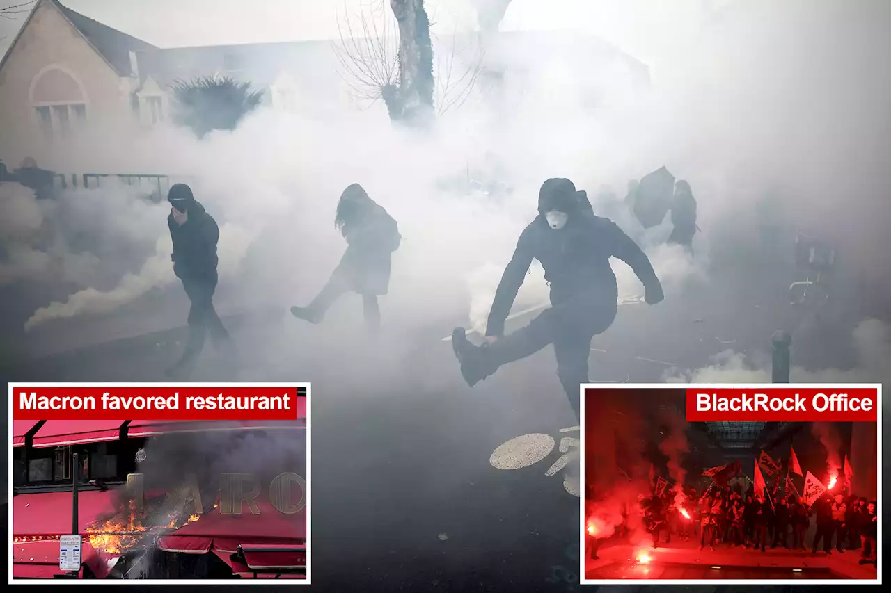 French pension protesters occupy finance firm, torch restaurant favored by Macron