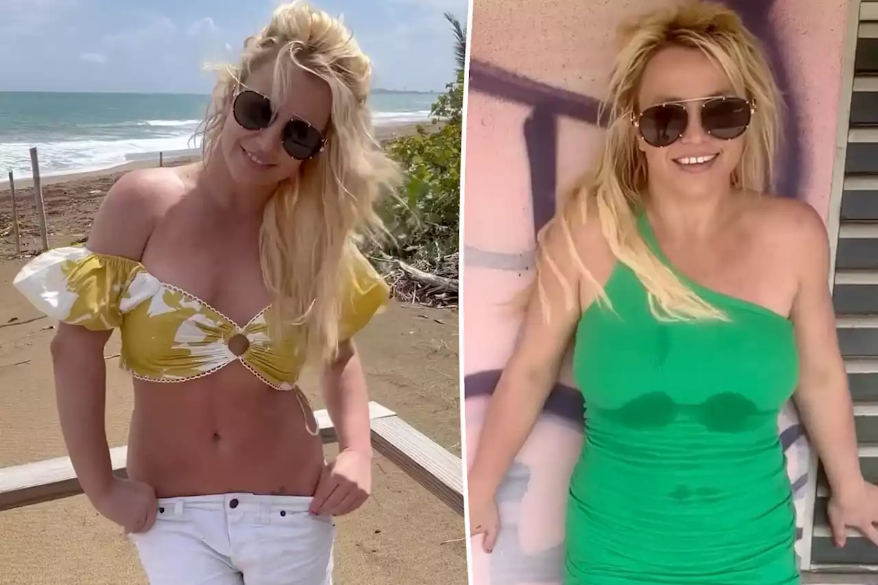 Britney Spears continues to live it up on vacation after ditching her wedding ring