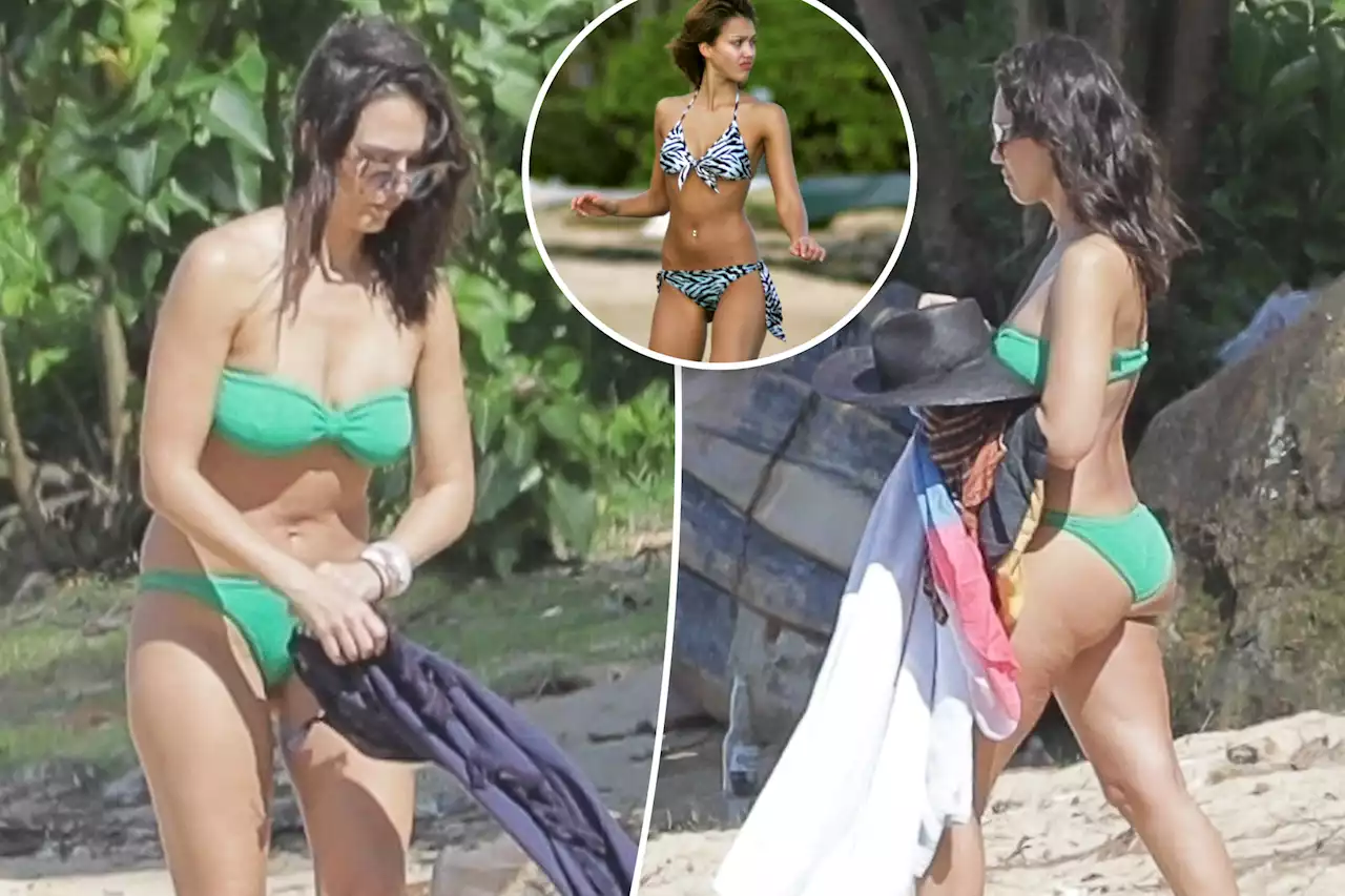 Jessica Alba hits the beach in a green bikini on family vacation