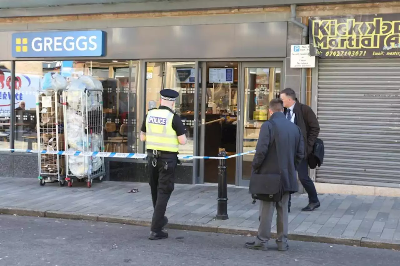 Man taken to hospital as Greggs taped off amid police incident