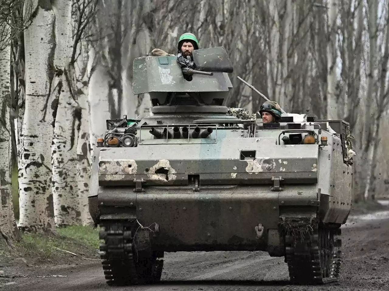 Ukrainian forces cling onto besieged city, China pressed to help end war