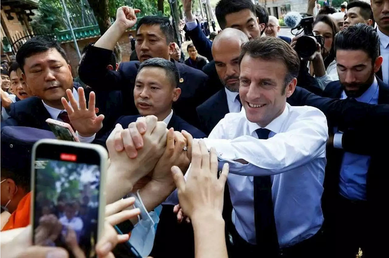 ‘Young and energetic’ French President Macron wins Chinese fans during Guangzhou visit