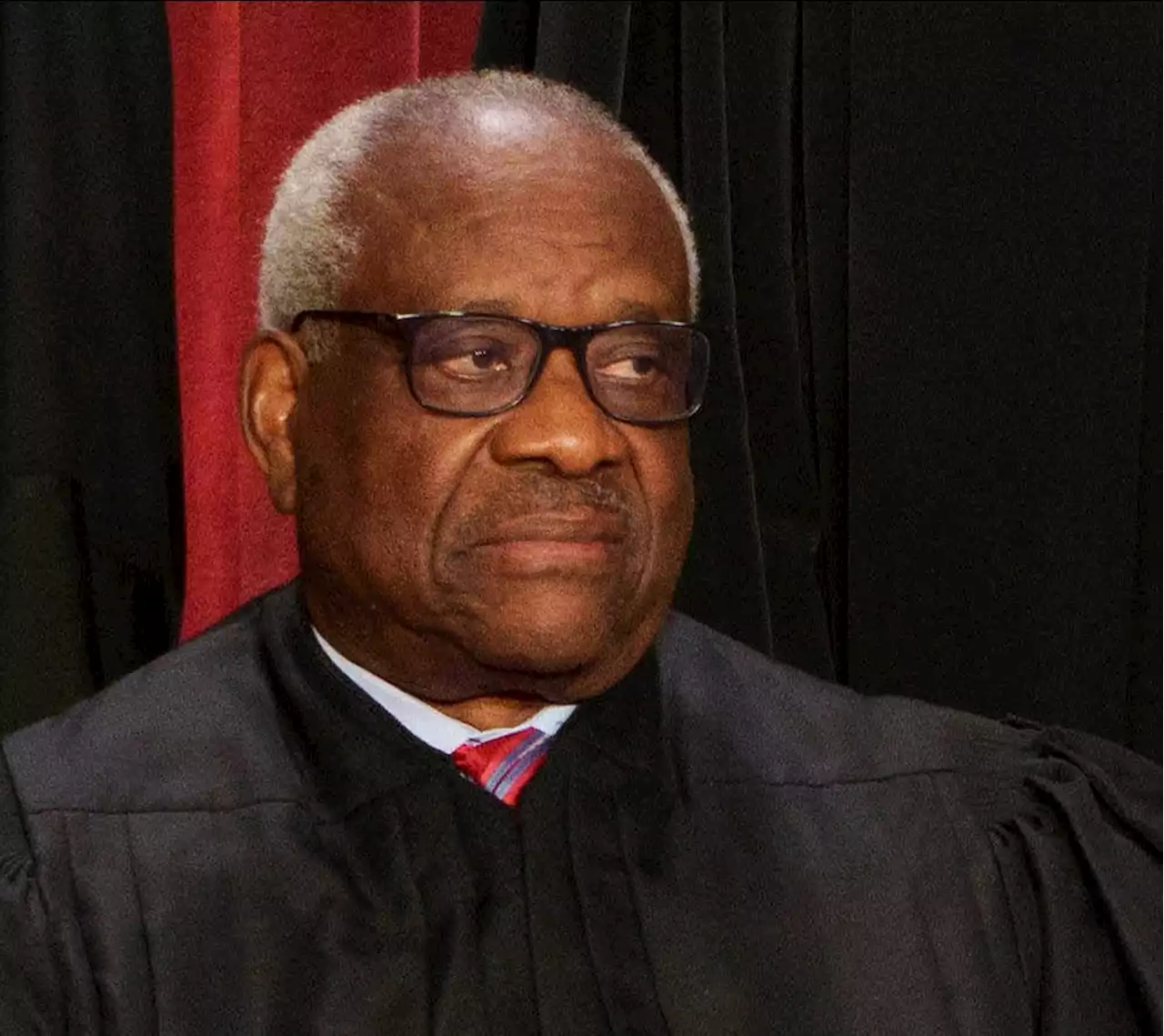 Supreme Court Justice Clarence Thomas says he wasn't required to report trips with GOP donor