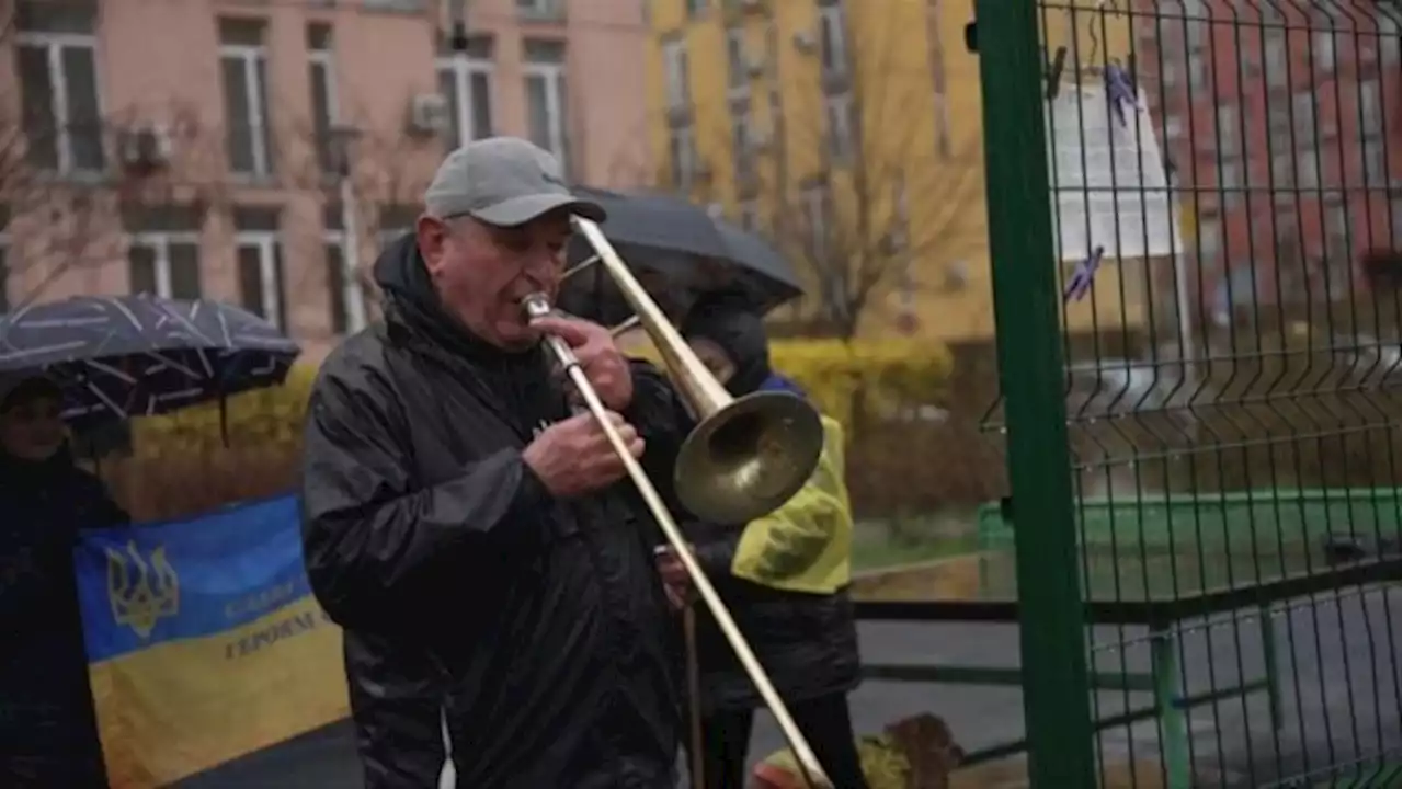 Musician Valentyn Dudkin, 80, vows to play trombone in Kyiv ‘until we win’