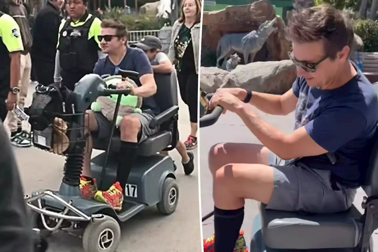 Jeremy Renner tours Six Flags on scooter after snowplow accident