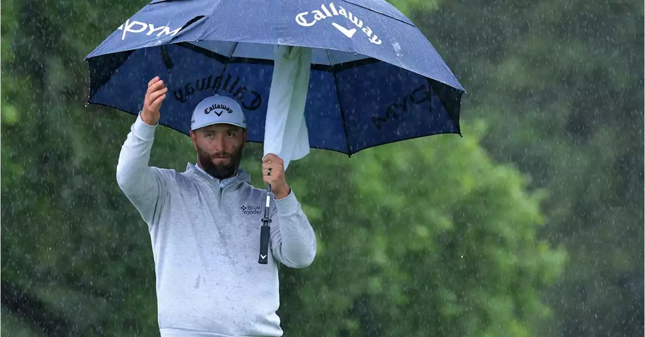 Rahm makes move at rainy Masters, two back of leader Koepka