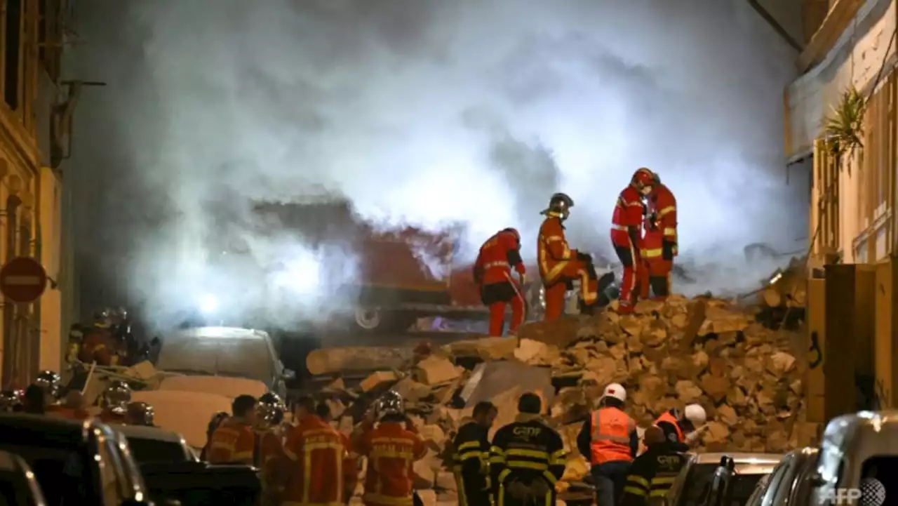 Marseille building collapse injures two, fire hampers search