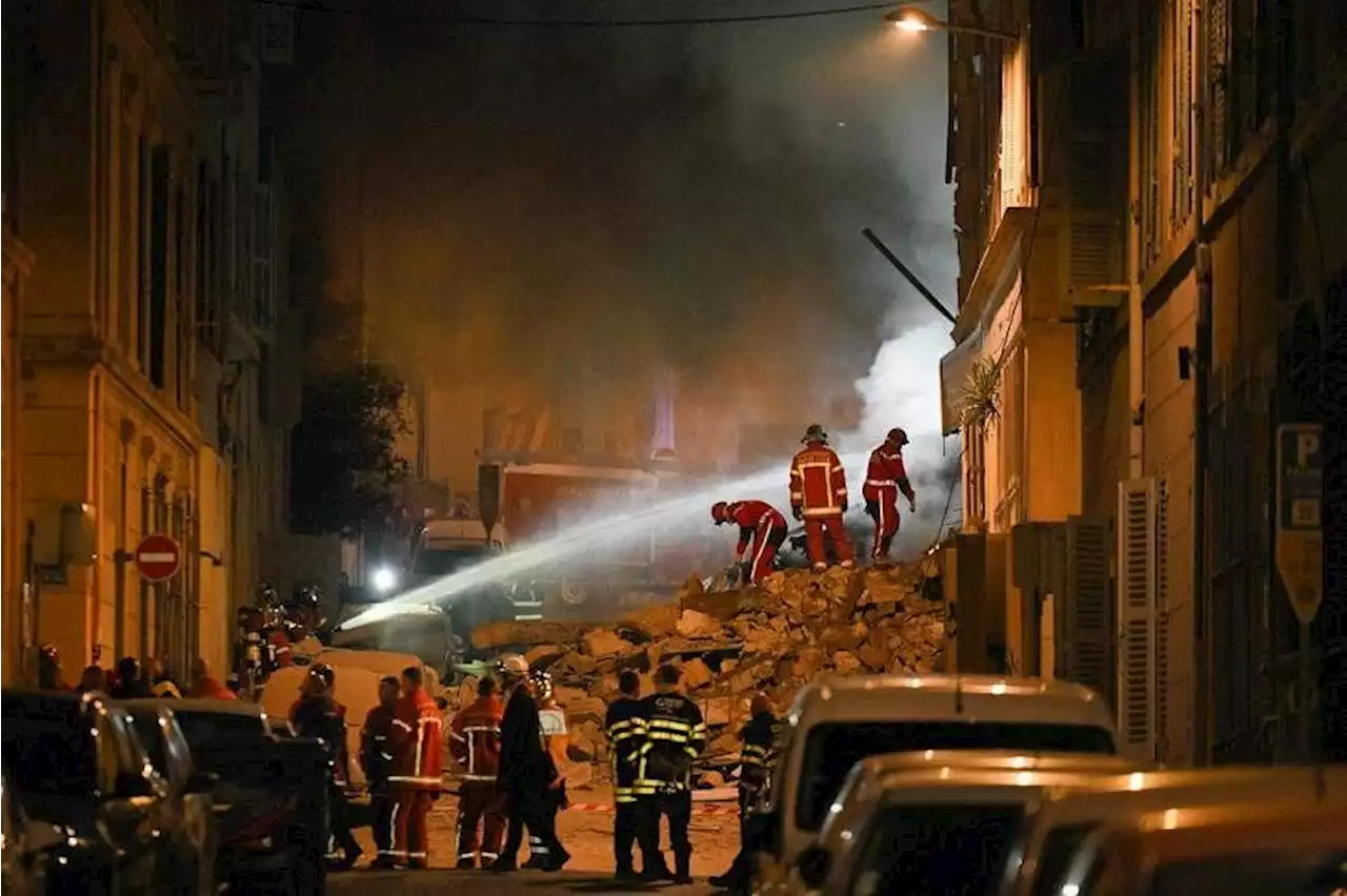 Marseille building collapse injures two, fire hampers search