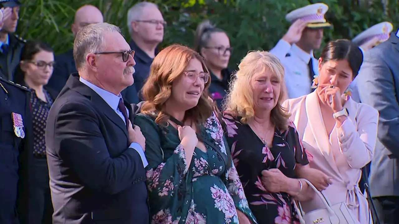 'They will forever know their dad was a hero': 1,000 mourners farewell slain NSW paramedic