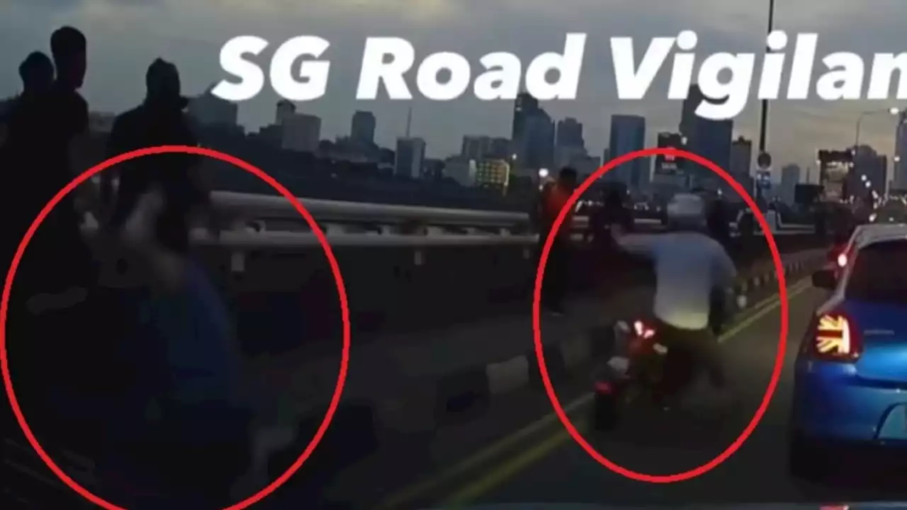 Speeding motorbike knocks down pedestrian, then hits car and overturns along congested Causeway - Singapore News