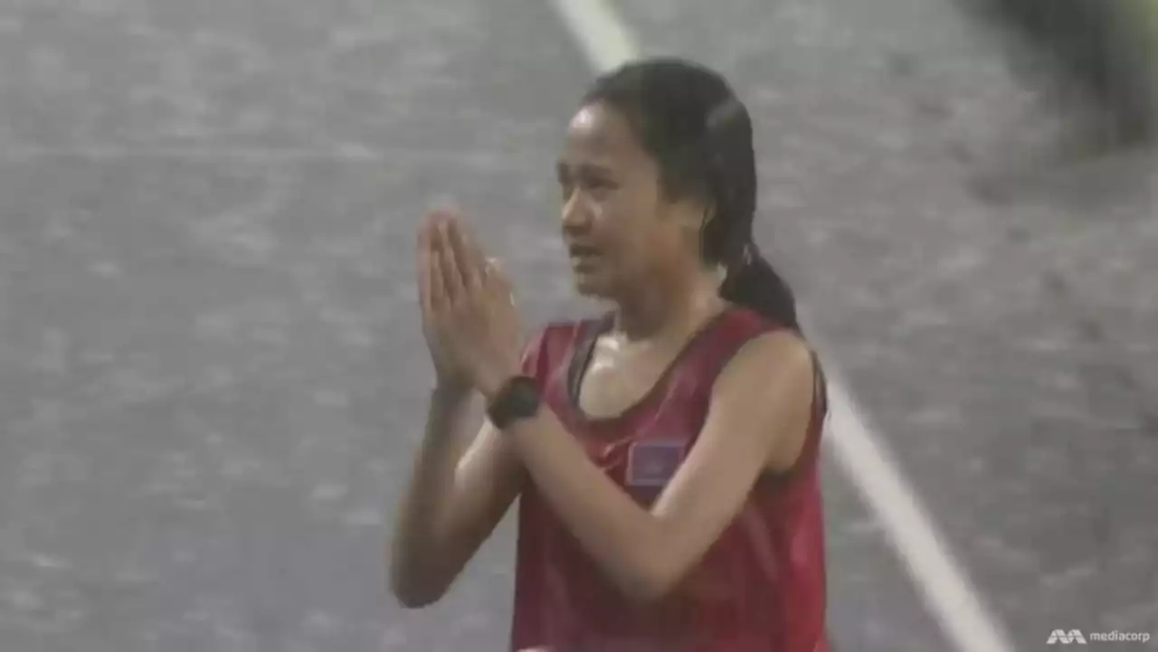 Rain-soaked Cambodian runner finishes last in SEA Games race but wins hearts