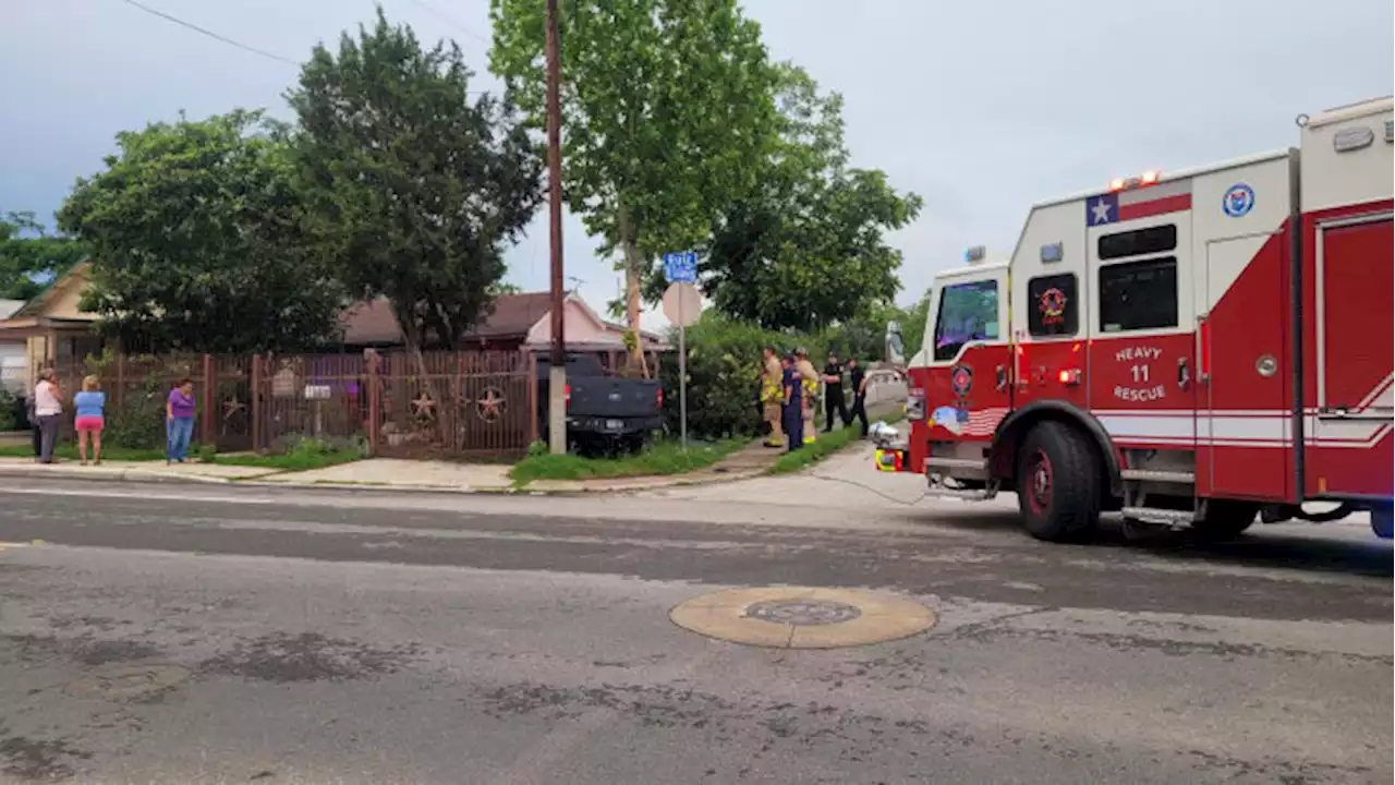 Driver crashes truck into pickup, fence and home on West Side before running away, SAPD says