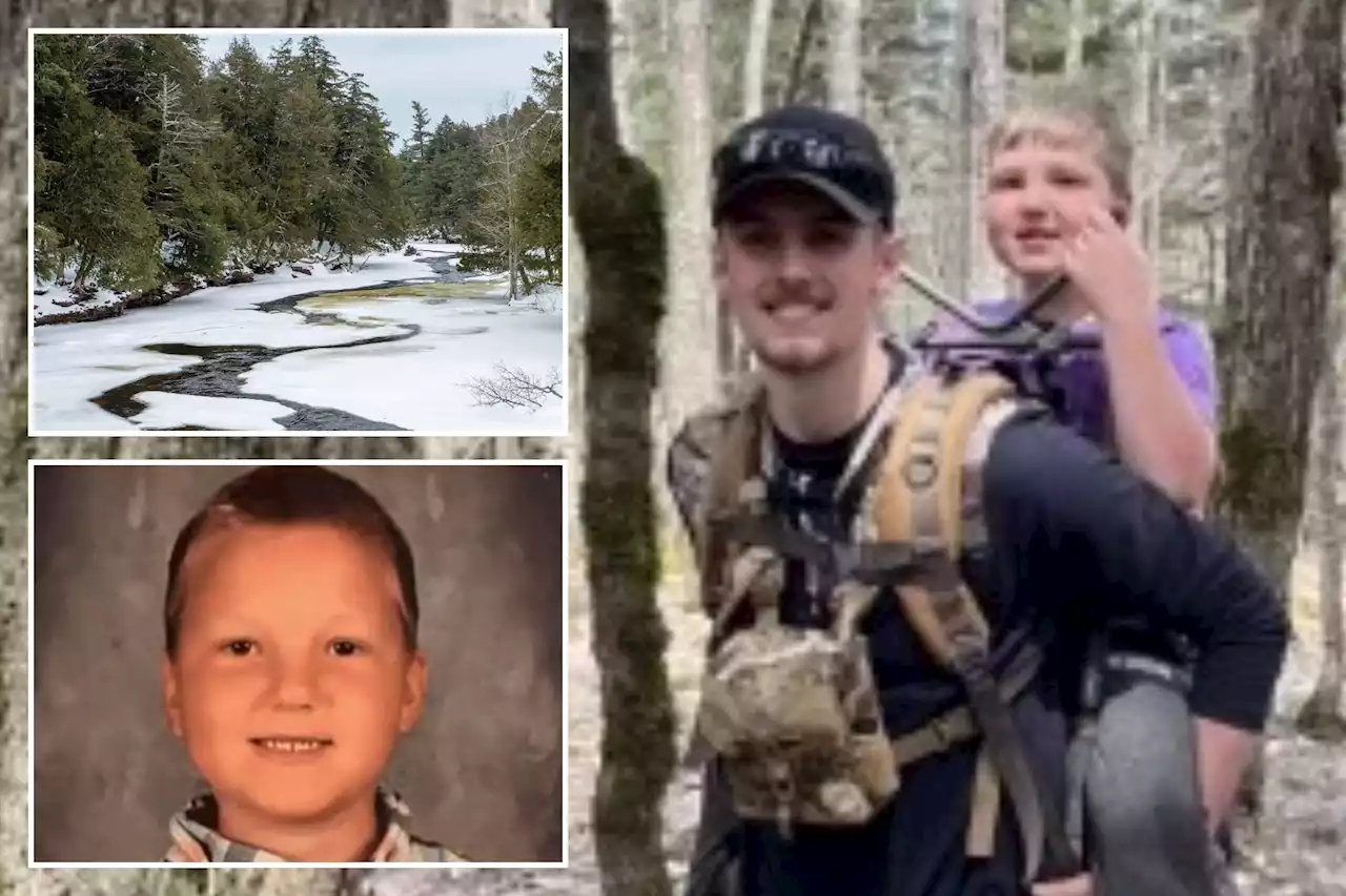 Missing 8-year-old survives two days in Michigan wilderness by eating snow, hiding under log