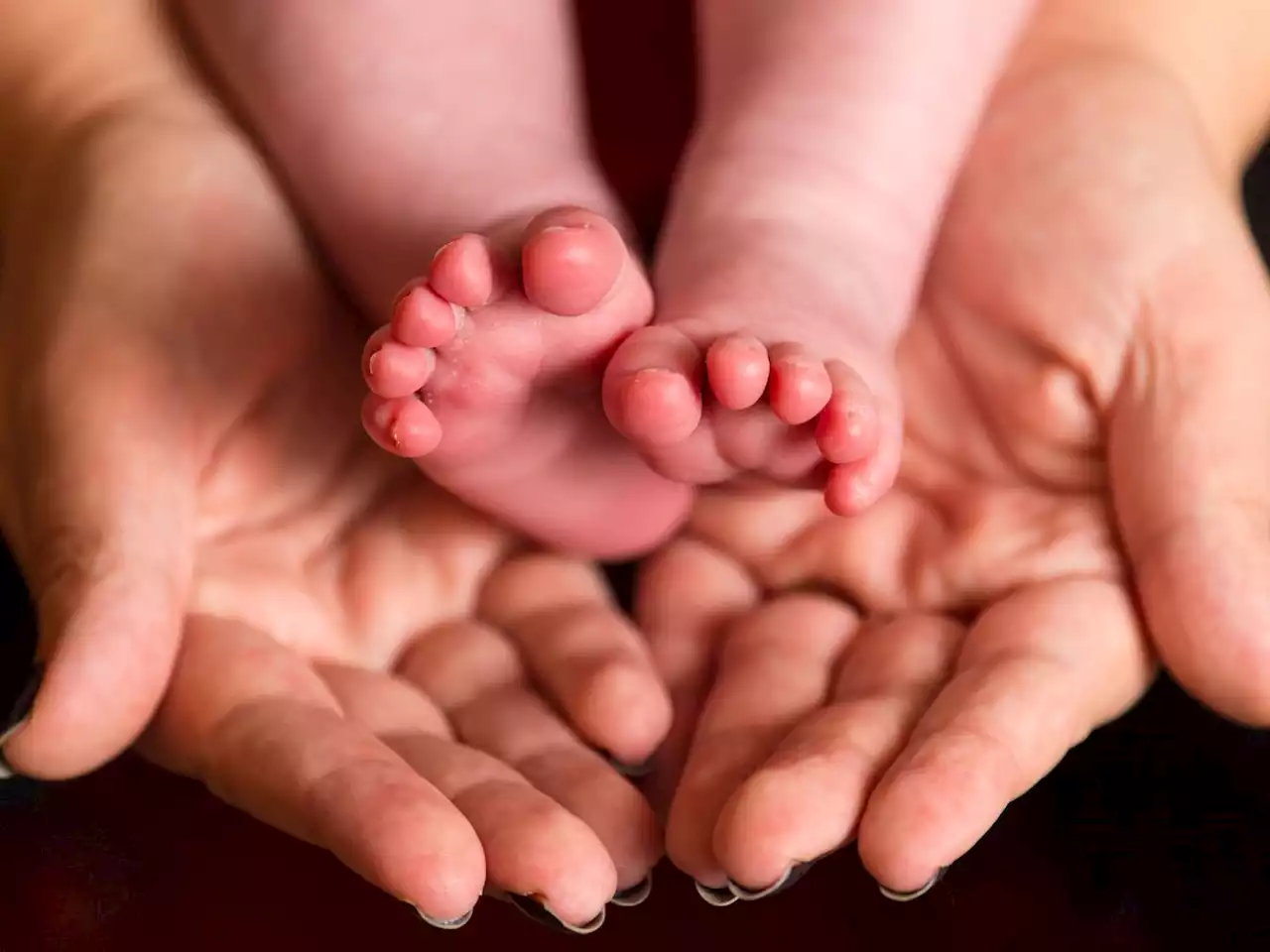 Baby with DNA from three people born in the UK