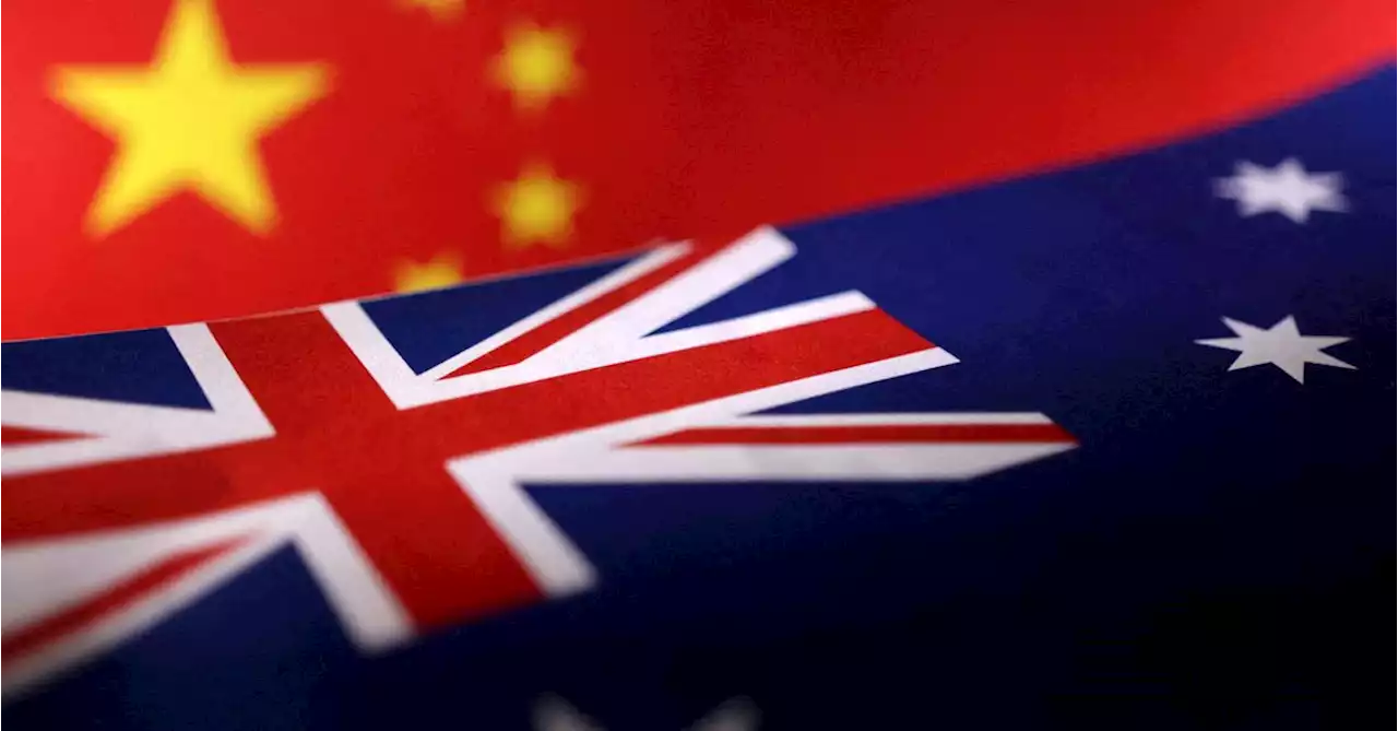 Australia's trade minister seeks end to trade curbs on visit to Beijing