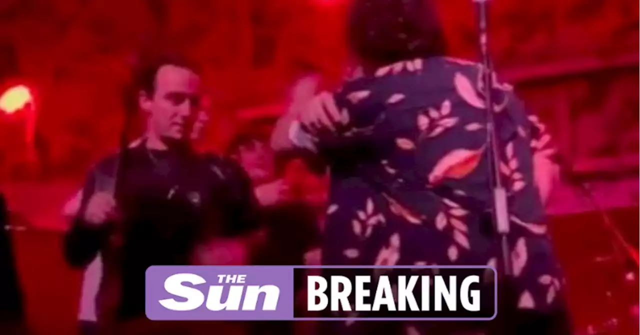 Noughties band shock fans as singer PUNCHES bandmate in brutal onstage brawl